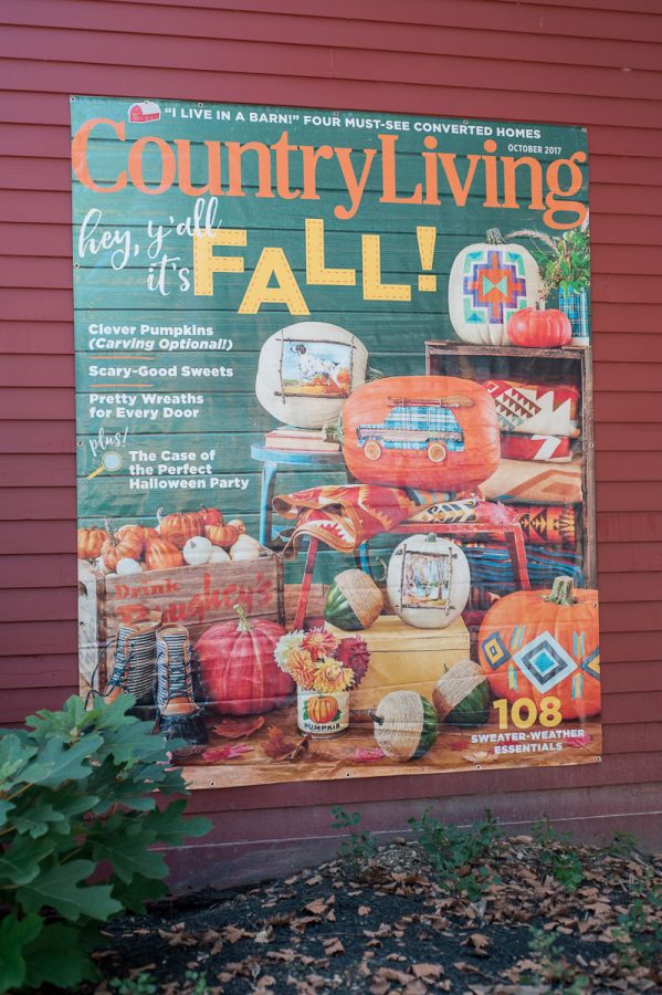 Country living magazine cover on the wall of a building
