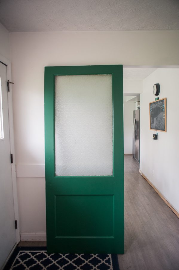 Vintage green door with glass